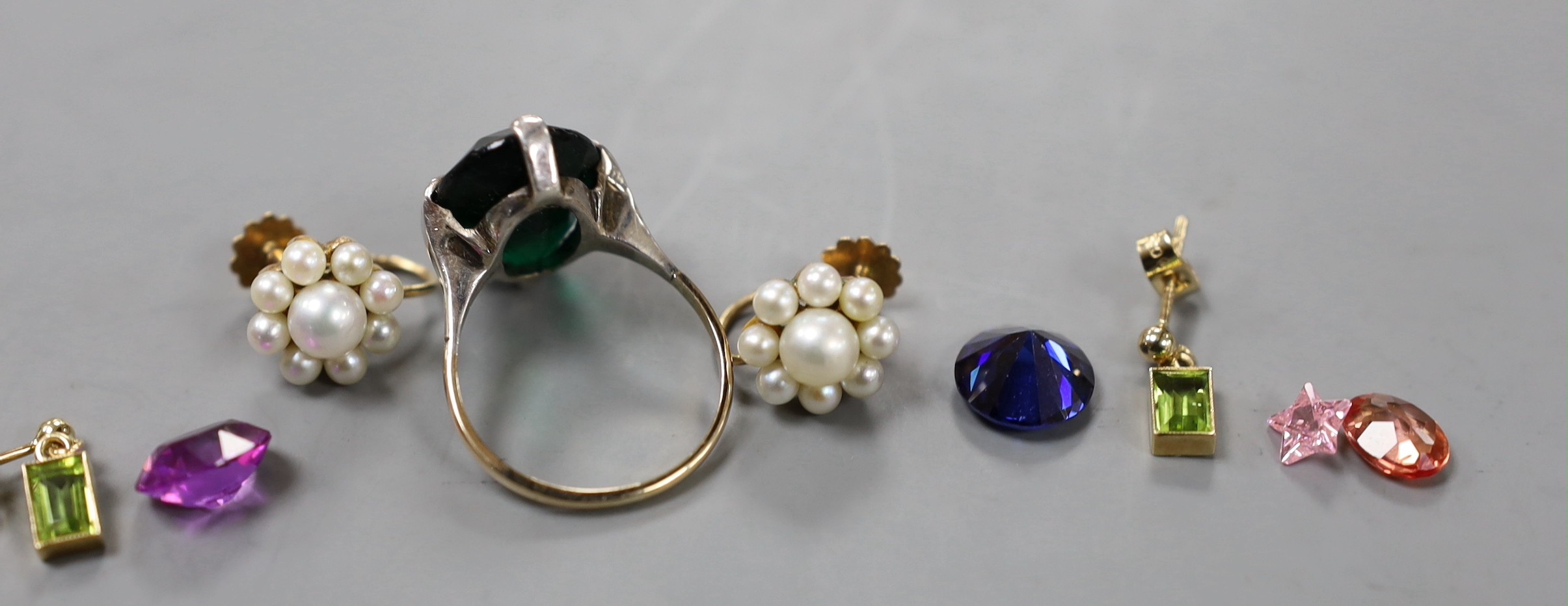 A pair of 9ct and cultured pearl cluster set ear clips, a pair of 9ct and gem set drop earrings, a 9ct and paste set dress ring and six unmounted cut stones.